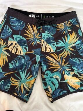 Salty Crew Men’s Black Swim Board Shorts with Teal & Yellow Tropical Print